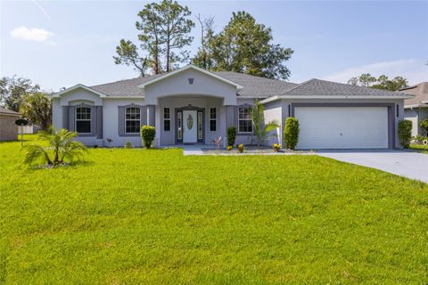Photo of 57 Renshaw Drive, Palm Coast, FL 32164 (MLS # FC312281)