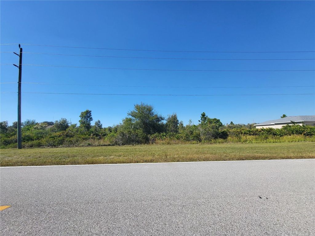 Photo of 9545 Calumet Boulevard, Port Charlotte, FL 33981 (MLS # D6144688)