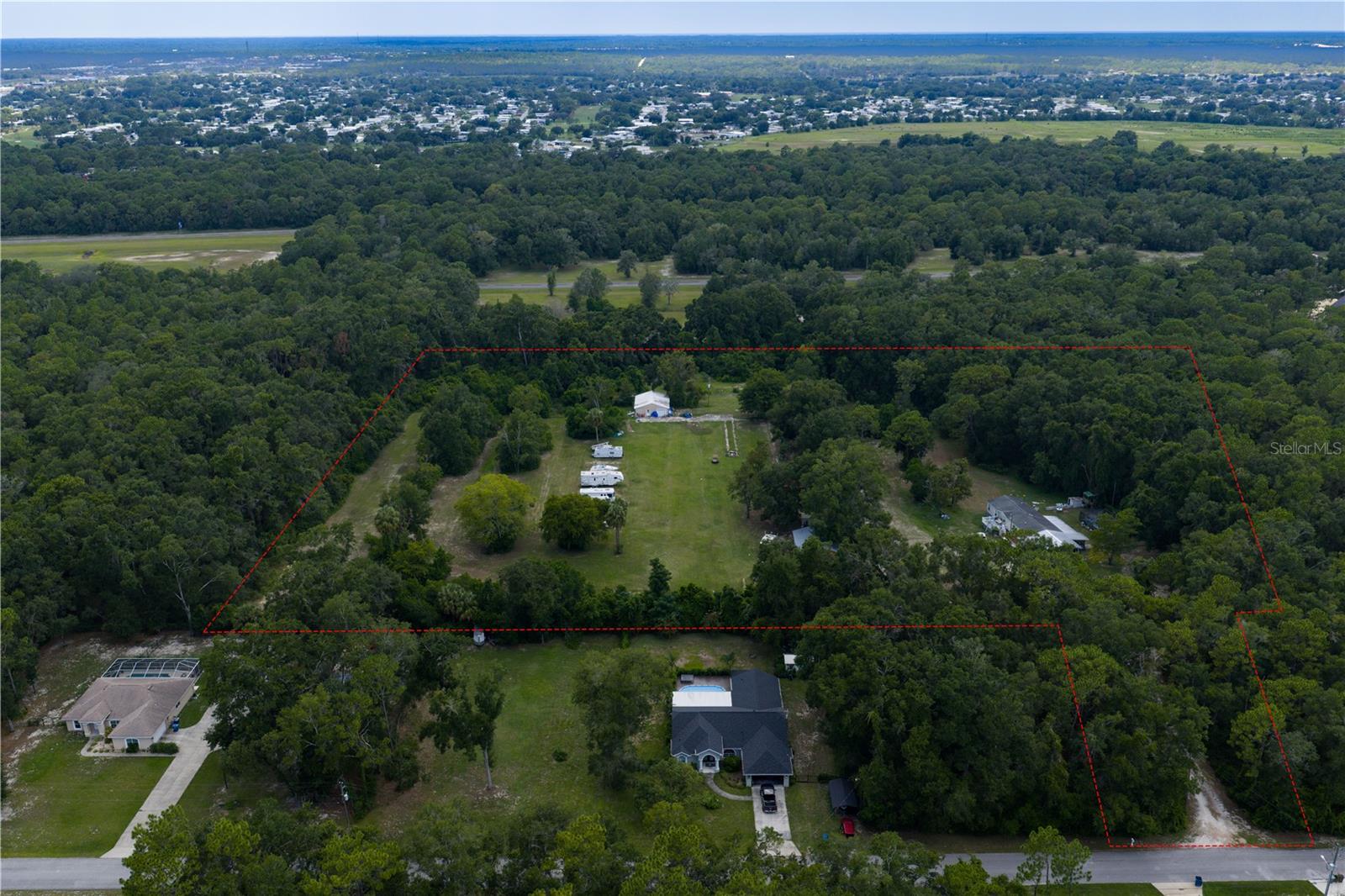 Prime 10.5 Acre Property (mol) in a Rapidly Growing Area not far off Cortez!
Don’t miss out on this 10+ acre parcel of prime land in one of the most exciting and rapidly developing areas! Situated right next to Diamond Estates (almost 30 acres), this property offers incredible potential for a variety of uses—whether you're looking to build a custom estate home, hold it as a smart investment for the future, or develop. There is currently a concrete block building that is currently has a bar, huge entertaining area, and bathroom for all your guests! There is a small barn/storage area for your equipement or convert it back to a barn. Also, this property alrady has 2 electric meters, one for the home and one for the entertaining area. Make this 10+ acres with plenty of space for your vision your home, or with the added option to purchase additional acreage from the neighboring property for even more possibilities.
This is a fantastic opportunity to secure land in a high-demand area. Don’t let this chance slip by!