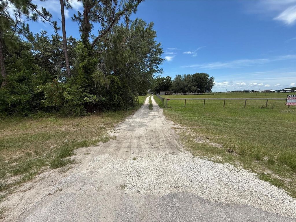 Photo of 17029 Lake Iola Road, Dade City, FL 33523 (MLS # TB8395729)