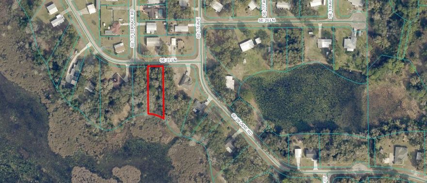 LOCATED IN LOVELY SILVER SPRINGS WOODS. WONDERFUL LOT ON A PAVED STREET, HIGH AND DRY WHERE THE HOME WILL GO. ON NORTH LAKE BRYANT. AWAY FROM CITY AND MIXED USE. MOBILES OR SITE BUILT HOMES OK.