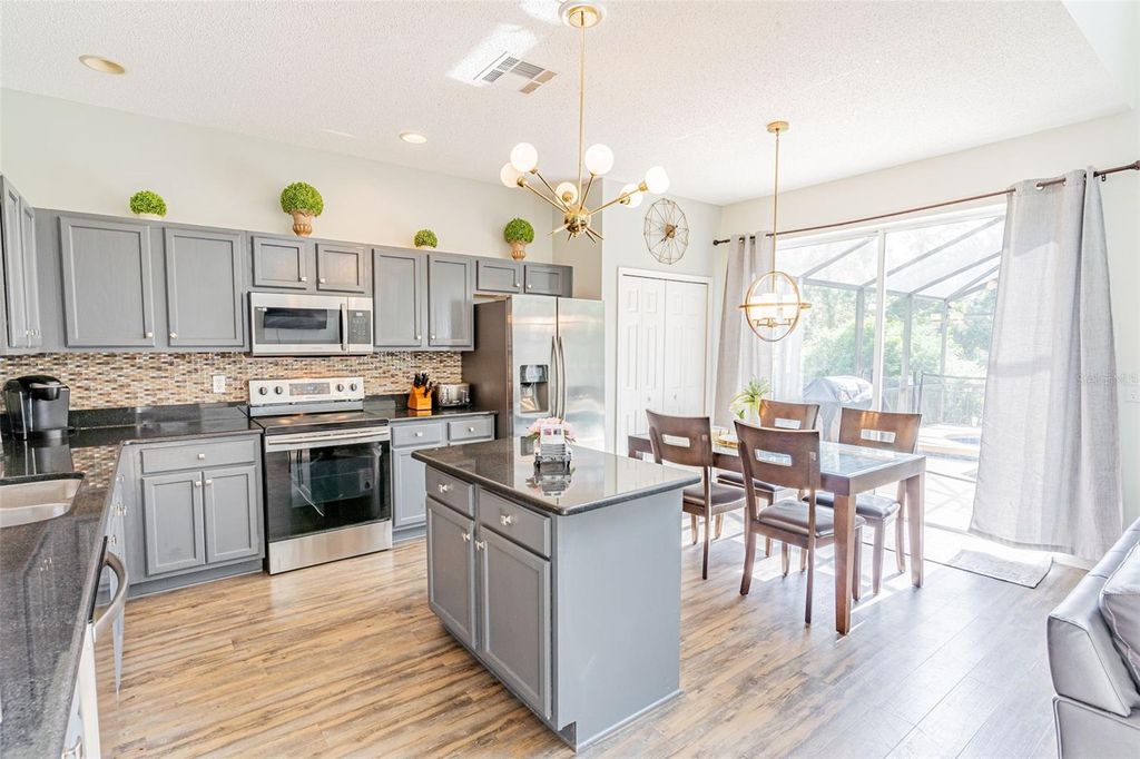 Photo of 8491 Oasis Key Cove, Kissimmee, FL 34747 (MLS # S5143577)