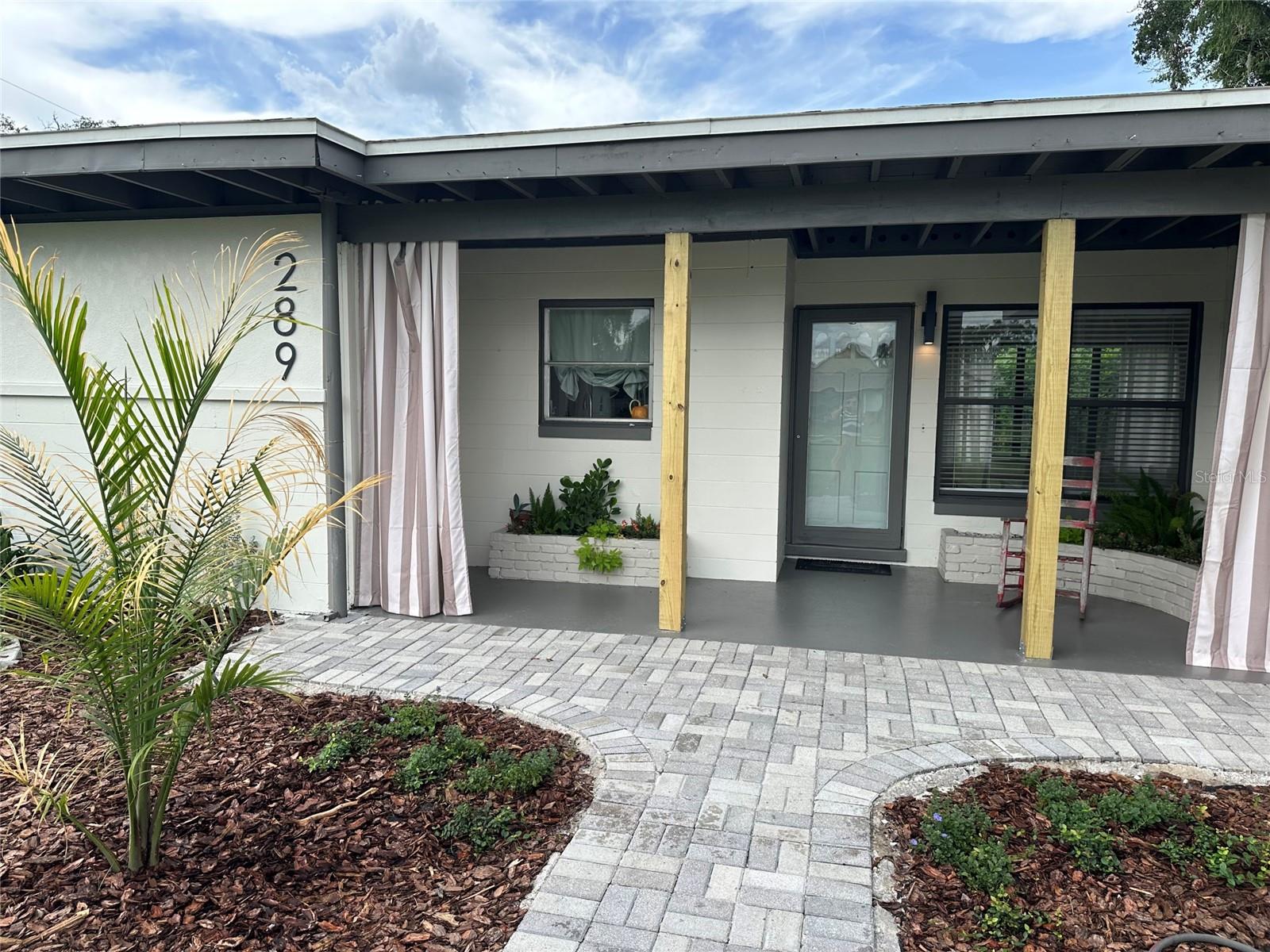 Freshly painted home on a large corner lot with updated landscaping. Offers 1,564 sq. ft. of living space with wood floors in main living areas, a spacious bonus room, and plenty of natural light. Move-in ready with great curb appeal!