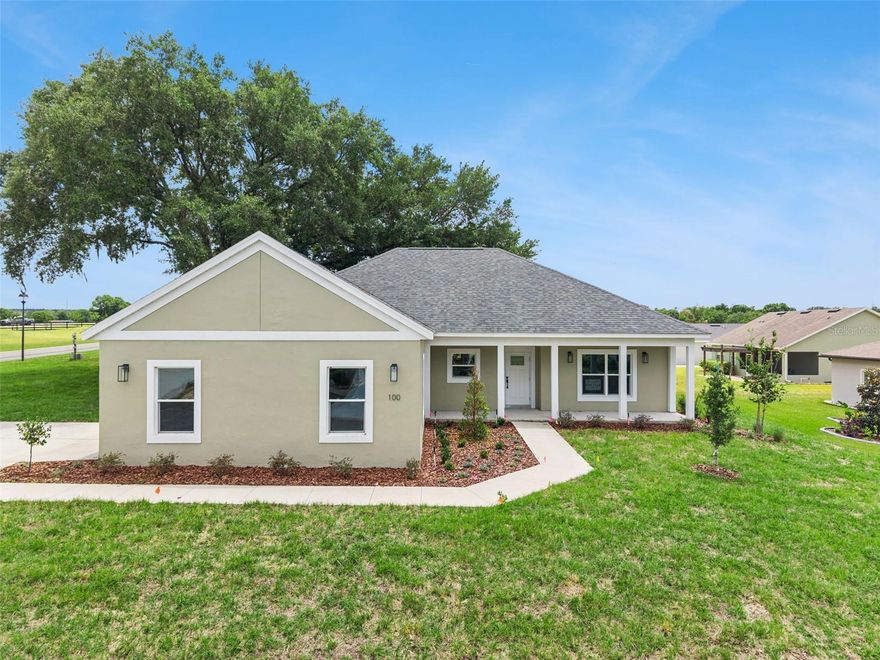 BRAND NEW HOME! 3-bedroom home with a coveted corner lot in a gated 55+ community. The property has fantastic curb appeal, with a Side entry garage and a welcoming front porch. Inside the front door, you’ll find a single-level layout with SCRATCH AND TEAR
RESISTANT LVP floors (no carpets here!), custom millwork, modern fixtures and a wall of windows & doors at the rear that fills the entire home with natural light. The huge kitchen features granite countertops and beautiful Shaker cabinets & drawers that provide so much storage space! The kitchen also offers stainless appliances, a pantry with a large island with provides seating for a crowd. The adjacent open living & dining areas connect directly to the backyard. Back inside, the private primary suite occupies its own wing of the home. The bathroom boasts a gorgeous custom-tiled shower and unique his & her vanities packed with storage options. The walk-in closet does triple-duty, also offering a laundry area and direct access to the garage. On the other side of the floor plan, the two guest rooms are separated by the welcoming hallway bathroom with exceptional features. Twin Lake Estates ia a 55+ community nestled in the rolling hills of North Umatilla. You’ll be close to all the retail shops in downtown Umatilla, with Eustis, Mt. Dora, Leesburg, Ocala & The Villages less than 30-45 mins from your front door. Enjoy the drive to the beach on either coast. Orlando and Disneyworld parks are just about an hour away. You will be impressed by the spacious living areas and upgrades. Home Warranty provided. Call today to see this one of a kind opportunity. NOTE: Interior Photos of previous model sold same basic floor plan. Some features may have been changed.