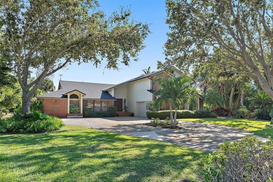 A rare opportunity to own a home in Riverview landings! Located at the Historic Desoto National Park and just a few miles to Anna Maria Island. This stunning and unique property is your personal oasis ready for entertaining. Updated and maintained to perfection, you can't get any better than this! The first floor gives you access to your expansive primary bedroom and ensuite with jacuzzi tub and dual sinks; providing access to the 4th bedroom that can easily be an office/den/nursery/gym. On the main floor you will also find your meticulously updated kitchen and massive living/entertaining space boasting a built-in wet bar with 2 wine fridges and pool table; this space can be your family room or the ultimate man cave! Each space has vaulted ceilings and French doors that open to the incredible saltwater pool with a waterfall feature and access to a HALF-ACRE of private maturely landscaped greenspace. Upstairs you will find two additional bedrooms with vaulted ceilings and an open landing overlooking your entryway and kitchen. Outside of the carefully curated floorplan the current homeowners have made some updates you don't want to miss: New hardwood flooring in the primary bedroom that runs seamlessly with the travertine stone and hardwood floors throughout. A brand-new stone coated metal roof, new pool pump, salt cell & pool cage all in 2025. Plus, two new Trane Air conditioners installed in 2024. The kitchen has had a stunning refresh with a Subzero refrigerator, Taj Mahal quartzite countertops, a 2-story pantry along with a stunning wine cellar/closet added in 2024. This home will provide you with HALF AN ACRE of land to call your own, tucked in a family-oriented neighborhood on a quiet cul de sac in a NON-FLOOD ZONE! Bring your kayaks, family and friends, this property is one you won't find very often!