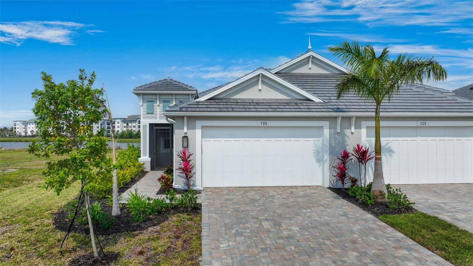 Unfurnished Annual Rental Available 8/1/25. Must see this stunning villa with private pool located in the resort-style living community of Watercolor Place. This gated community and Boca Grande Model built by Medallion Homes, offers Low-maintenance living. As you arrive at you will notice the oversized 2 car garage, beautiful tile roof and brick paver driveway. This spacious home offers 1625 sf of living space with an open floorplan and split bedrooms. The kitchen boasts elegant wood cabinets, stylish quarts counter tops and top-of-line stainless steel appliances including a conduction cooktop and a French door refrigerator. The primary suite impresses with his and her walk-in closets and double vanities in the primary bath. Sit on your oversized lanai and sip your glass of wine overlooking the majestic pond. You will love that this community offers residents a wide range of amenities including a heated swimming pool, fitness center (coming in 2024) and a clubhouse to gather with neighbors. Rolldown Hurricane shutters have been installed for added protection. Only a short distance to Lakewood Main Street shopping, restaurants, and cinema. Convenient to the UTC Mall, shopping, restaurants, entertainment, and Lakewood Ranch Hospital. Easy access to I-75, Sarasota Airport, Tampa International Airport, and Tampa/St. Petersburg. Only Minutes from Nathan Benderson Park with world class rowing events, premier sports fields and world class beaches. Rent Includes Basic Cable, Internet, and Lawn Care.