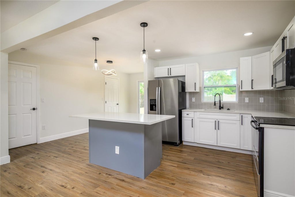 Photo of 6711 S Gabrielle Street, Tampa, FL 33611 (MLS # O6419789)