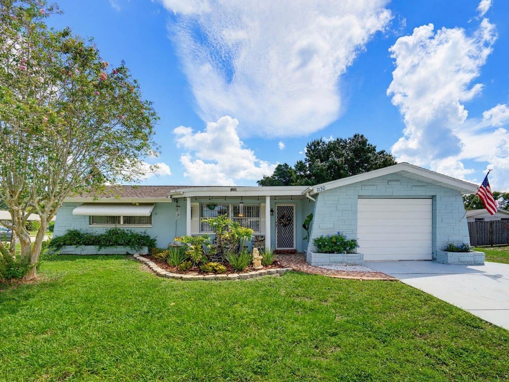 Photo of 7130 Hollybay Road, New Port Richey, FL 34653 (MLS # W7889760)