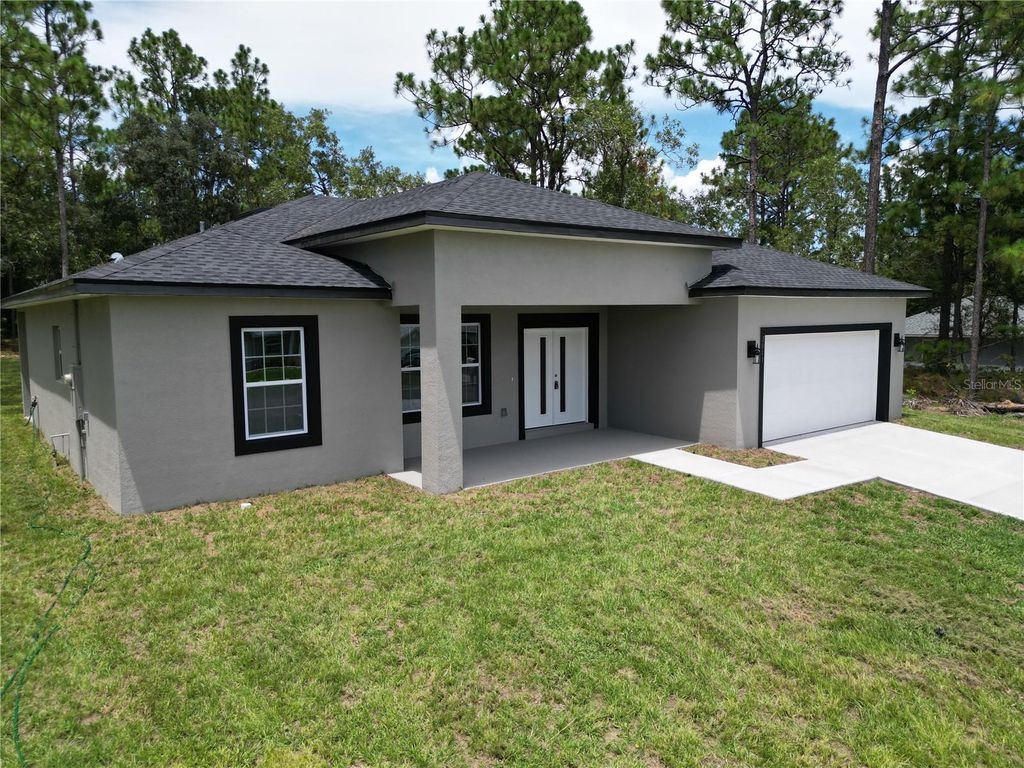 Photo of 2011 W Tacoma Drive, Citrus Springs, FL 34434 (MLS # O6323522)