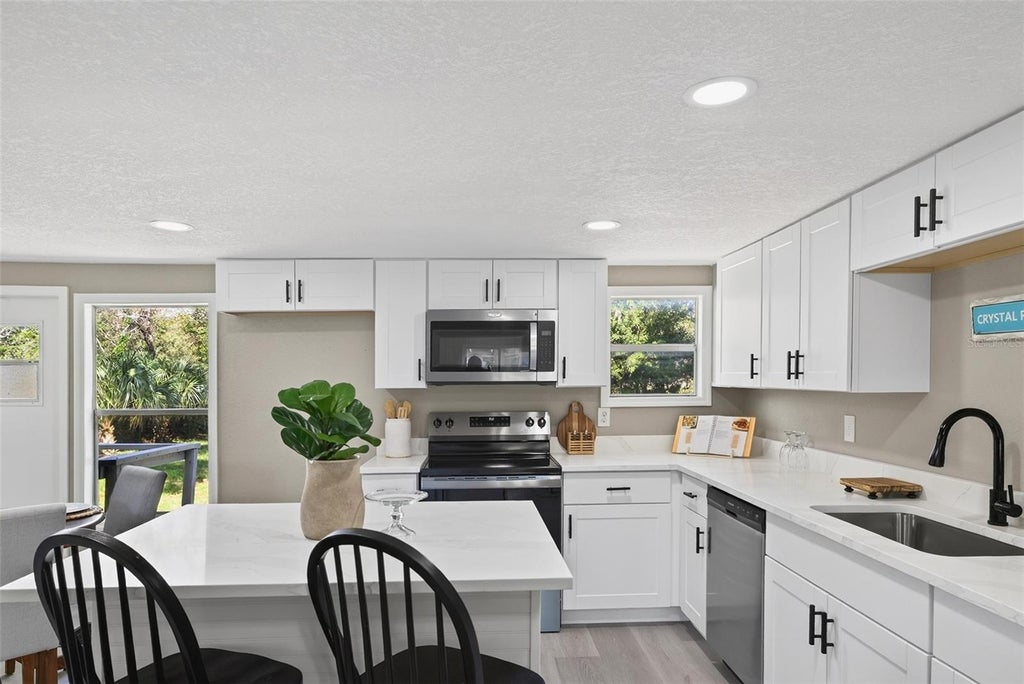 Photo of 7149 W Hadenotter Lane, Homosassa, FL 34446 (MLS # W7890706)