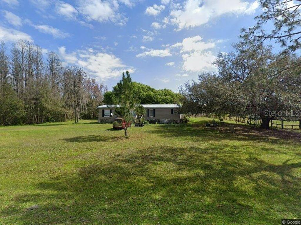 Photo of 3426 Fox Ridge Boulevard, Wesley Chapel, FL 33543 (MLS # J983171)