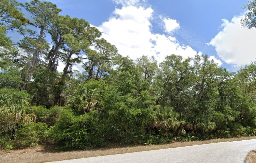 Photo of 2152 Dorion Street, Port Charlotte, FL 33948 (MLS # OM709761)