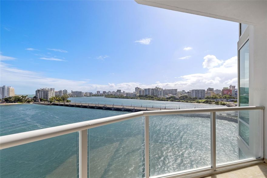 Welcome to this extraordinary residence in the vibrant city of San Juan, Puerto Rico. This stunning three-bedroom, three-and-a-half-bathroom apartment offers a luxurious blend of modern design and breathtaking views. Floor-to-ceiling windows bathe the interiors in natural light and provide sweeping views of the city skyline and the tranquil waters just beyond. The open layout is enhanced by elegant marble flooring, designer lighting, and chic finishes, creating an inviting atmosphere perfect for entertaining or relaxing in style.
The gourmet kitchen is a chef's dream, featuring high-end stainless-steel appliances, custom cabinetry, and an expansive island with ample seating. This seamlessly connects to the spacious dining and living areas, which open to a private balcony where you can savor Puerto Rico’s tropical breezes and picturesque sunsets. Each bedroom is a private sanctuary, with ample closet space and luxurious bathrooms featuring premium stone accents.
Residents of Laguna Plaza enjoy exclusive access to a variety of resort-style amenities. Relax by the beautifully maintained pool, stay active in the state-of-the-art fitness center, or explore the nearby restaurants and shopping destinations. With its prime location, unmatched views, and world-class amenities, Laguna Plaza Apartment 702 offers a unique opportunity to experience the best of luxury living in one of San Juan's most desirable communities.