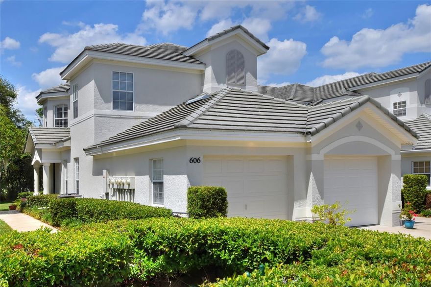 Let's impress your friends and family by living at the Grassland Golf and County Club.  Presenting a rare opportunity: a spacious three-bedroom, two-bath, ground-floor condo with a two-car garage in the highly sought-after Muirfield Village area of Grasslands Golf and Country Club. This desirable location is ideal for commuters, offering quick access to the Polk County Parkway for travel between Orlando and Tampa. The low monthly association fee for only $580.00 Monthly fee covers exterior condo building maintenance, gated entry, basic cable, water, trash, sewer, grounds upkeep, and pest control. The unit features a Speed Queen laundry center, upgraded cabinetry in the garage, and a convenient doggy shower in the garage. There’s also a separate storage area, attic with installed flooring, and an oversized garage complete with an attractive epoxy finish. Inside, the master suite boasts a garden tub, dual closets with built-ins, and his-and-her sinks. Plantation shutters adorn the windows throughout, and a new AC with allergy filter system was installed in January 2026. The back patio is paved and overlooks a private landscaped backyard, perfect for relaxing or entertaining. A bonus room is available for exercise equipment or as a sitting area.  Residents of Grasslands Golfing Country Club enjoy access to premium amenities for a separate membership.....which would be available a clubhouse, championship golf course, tennis and pickleball courts, swimming pools, fitness center, and much more. This property combines luxurious features with a prime location—making it a truly exceptional find.