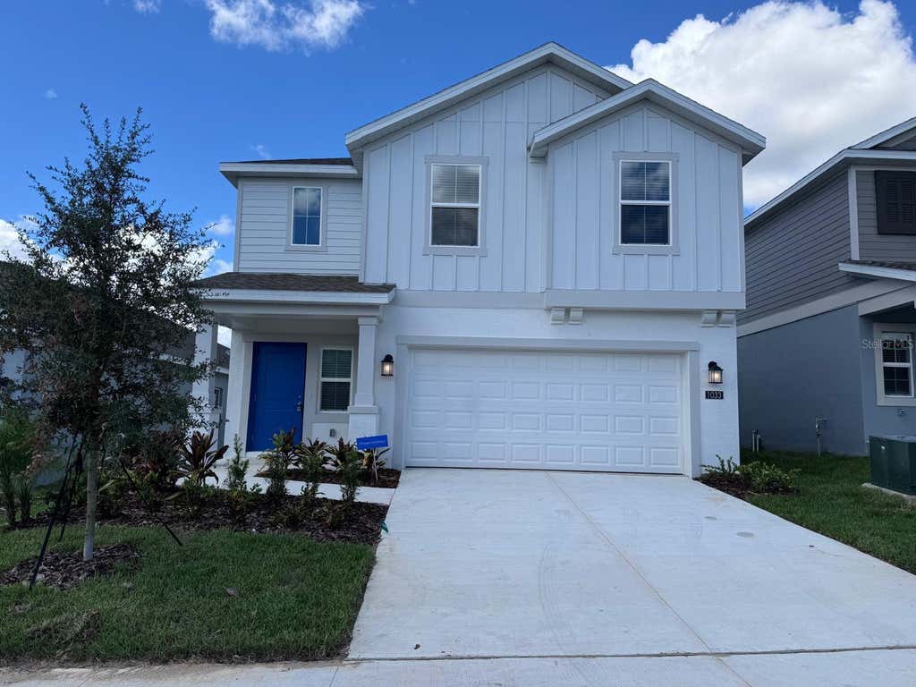 Photo of 1033 Waterfall Boulevard, Davenport, FL 33837 (MLS # O6434841)