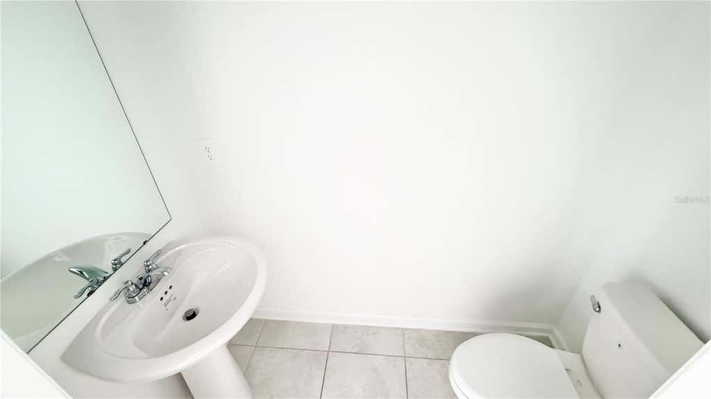 Photo of 1033 Waterfall Boulevard, Davenport, FL 33837 (MLS # O6434841)
