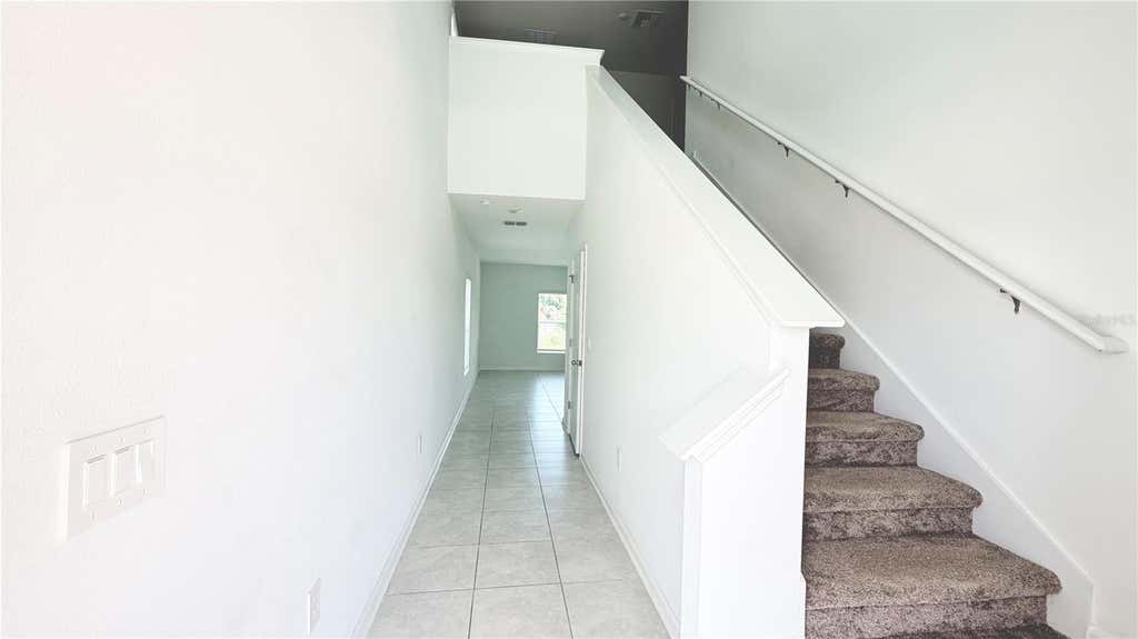 Photo of 1033 Waterfall Boulevard, Davenport, FL 33837 (MLS # O6434841)