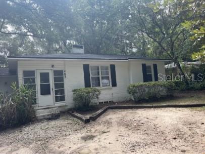 Charming 3-bedroom, 2-bath home with a spacious backyard and ample parking, just minutes from the University of Florida! This home features beautiful wood floors, a convenient split floor plan, and essential appliances, including a washer, dryer, and dishwasher. Enjoy the enclosed front porch, perfect for relaxing or entertaining.