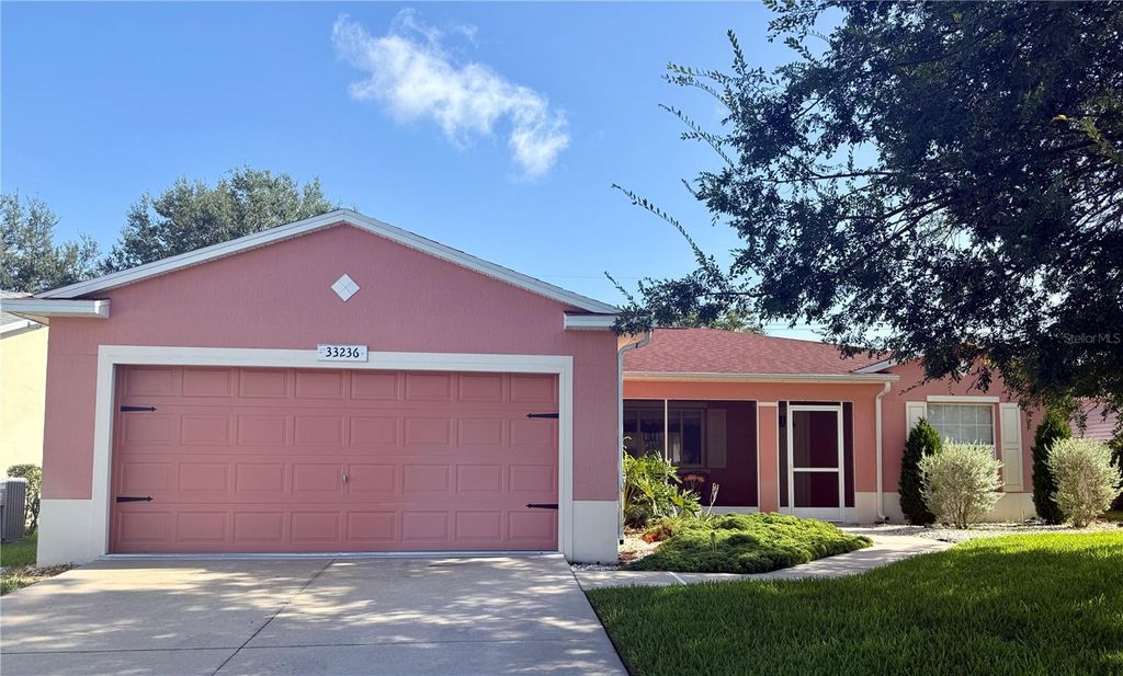 Photo of 33236 Grand Cypress Way, Leesburg, FL 34748 (MLS # G5114915)