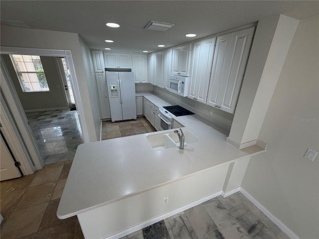 Photo of 8427 Leatherleaf Lane, Orlando, FL 32827 (MLS # O6358239)