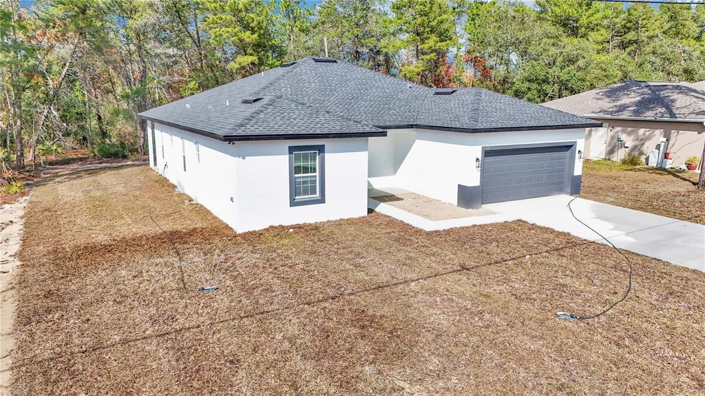 Photo of 16630 SW 50th Circle, Ocala, FL 34473 (MLS # O6371351)