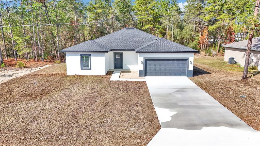 Photo of 16630 SW 50th Circle, Ocala, FL 34473 (MLS # O6371351)