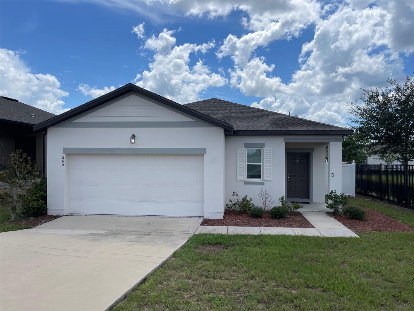 Welcome to 865 Orchid Grove Blvd, a charming and well-maintained single-family home located in the desirable community of Orchid Grove in Davenport, FL. This spacious 3-bedroom, 2-bath residence features a bright, open-concept floor plan, perfect for comfortable living and entertaining.
The home boasts a modern kitchen with stainless steel appliances, ample cabinetry, and a large island overlooking the dining and living areas. The primary suite includes a walk-in closet and an en-suite bathroom with dual sinks and a walk-in shower. Two additional bedrooms and a second full bath offer flexibility for guests, a home office, or a growing family.
Step outside to a neatly landscaped yard and covered patio—ideal for enjoying Florida’s beautiful weather. Additional features include a two-car garage, tile flooring in main living areas, and energy-efficient design.
Located just minutes from shopping, dining, I-4, and theme parks, this home offers convenience and comfort in a quiet, friendly neighborhood.