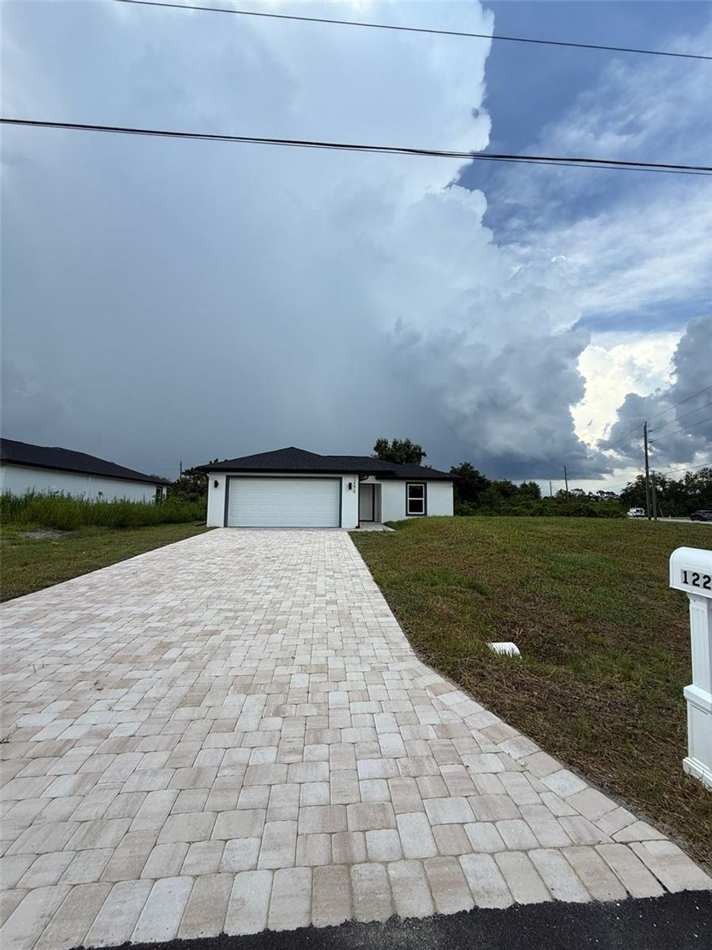 Photo of 12276 Edwards Road, Port Charlotte, FL 33981 (MLS # O6337717)