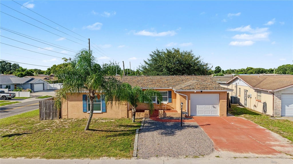 Photo of 7501 Foxbloom Drive, Port Richey, FL 34668 (MLS # TB8549261)