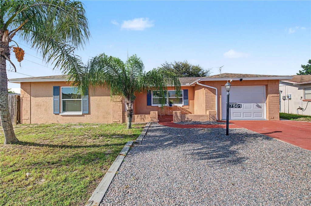 Photo of 7501 Foxbloom Drive, Port Richey, FL 34668 (MLS # TB8549261)