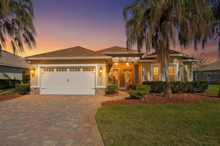 WATER VIEWS, WOW FACTOR & AN ALL-SEASONS GLASS-ENCLOSED LANAI YOU'LL NEVER WANT TO LEAVE!

Welcome to the Florida lifestyle buyers dream about. Tucked inside the TRULY GATED, AMENITY-RICH COMMUNITY of Lakeside Landings, just minutes from The Villages, this beautifully maintained 2015-built home offers 4 bedrooms, 2 bathrooms, and 2,319 square feet of bright, comfortable living with the kind of WATER VIEWS that instantly make you feel at ease.

From the moment you arrive, the BRICK PAVER DRIVEWAY and SCREENED FRONT PORCH create a WARM AND INVITING first impression. Inside, the home features tile flooring throughout the main living areas, PLANTATION SHUTTERS, RECESSEd LIGHTING, GRANITE COUNTERTOPS, and a desirable SPLIT-BEDROOM FLOOR PLAN that offers both privacy and functionality. The flexible 4th bedroom, which does not have a closet, is ideal for a HOME OFFICE, den, hobby room, or guest space.

But the true star of the show is the stunning, FULLY GLASS-ENCLOSED ALL SEASONS LANAI. Finished with luxury vinyl plank flooring and showcasing PANORAMIC WATER VIEWS with three beautiful fountains, this space is pure magic. Whether you’re starting your morning with coffee, winding down with a glass of wine, or simply soaking in the peaceful view, this is the kind of space that elevates everyday living and makes home feel like a RETREAT.

And the lifestyle does not stop at your front door. Lakeside Landings offers exceptional resort-style amenities, including a sparkling pool with waterfalls and fountains, a second pool, jacuzzis at both pools, pickleball and tennis courts, basketball, a playground, two dog parks, a fitness center, library, and billiards room. Plus, with The Villages just around the corner (JUST A GOLF CART RIDE AWAY!), you are close to shopping, dining, entertainment, golf, and all the everyday conveniences that make this location so appealing. Call today for your private or virtual showing and let's get you SETTLED IN SUNSHINE!