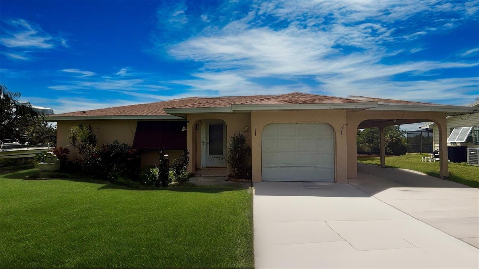 Check out this GULF ACCESS pool home situated on a spacious 0.28-acre lot in Punta Gorda’s desirable Peace River Shores! Enjoy the waterfront lifestyle with your own private boat ramp, making it easy to launch right from your backyard. Inside, the home features a comfortable 2 bedroom, 2 bathroom floor plan with plenty of natural light. A newer shingle roof (2023) provides added peace of mind. Perfect for entertaining, the large sunroom opens to the screened swimming pool area, creating the ideal space for gatherings. Outside, there’s ample room to store trailers, boats, or an RV, along with a large storage shed for all your extras. Don't miss this rare opportunity - schedule your tour today!