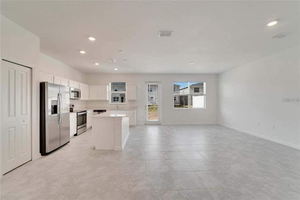 Photo of 9038 Mulligan Island Lane, Davenport, FL 33896 (MLS # O6429882)