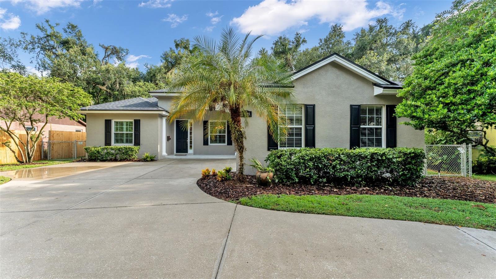 Just Listed! Check out this gorgeous move-in-ready 5 bedroom, 3 bath home nestled in the heart of Lakeland! With 2,766 square feet of living space and 3,436 square feet total under roof - there is room to spread out! At the time of building nearly every available upgrade was selected, and now recently the sellers have done many upgrades and updates making the home feel nearly brand new! This residence offers modern floorplan and features many upgrades including real hardwood floors, crown moldings, arched doorways, plantation shutters, built-in shelving, wainscoting, upgraded fixtures, and more. Once you step inside, you'll find an open-concept design with a stylish gourmet kitchen, generous living spaces, and a triple split bedroom plan. There is a formal dining room, formal living room, family room, dinette, and a den/bonus room. The den provides flexible options for hosting guests, a home office, a playroom, or add a closet & make it a 6th bedroom.
The gourmet kitchen is the heart of the home and truly a chef's delight, complete with double wall ovens, New gas cooktop, New stainless steel refrigerator, New Bosch dishwasher, ample cabinetry and counterspace, a large breakfast bar, center island, corian counters, and an amazing walk-in pantry. You are seriously going to LOVE the size of this pantry! The unique split bedrooms plan allows for privacy for all. The luxurious primary suite is a serene retreat, complete with a luxe ensuite bathroom featuring a dual sink vanities with ample cabinetry, expansive walk-in shower, soaking bathtub, private water closet, linen closet, and a huge walk-in closet.
Additional features include lots of storage with many storage closets, a laundry room with deep sink & cabinetry. Outdoor living includes an expansive wood deck overlooking a private fenced backyard, new chain-link and wood privacy fences. The parking space is fantastic with an extended 2-car garage and a circular driveway for added convenience.
Extensive recent updates and upgrades just completed within the last few years include New Roof (2025), New fresh interior and exterior paint (2025), New carpeting in bedrooms (2025), Newly rebuilt deck (2025), New fences (2025), New gas cooktop (2025), New hot water heater (2025), New windows, New Ac’s, New fans & fixtures, Newly remodeled bathrooms, New plumbing fixtures, and much more.
Set in an established desirable area with beautiful shade trees and historic homes, this location offers the ability to walk to shopping, restaurants, coffee shops, ice cream parlors, Lake Hollingsworth, and several local parks plus easy access to Downtown Lakeland and the Polk Parkway to Tampa or Orlando. There isn't a more beautifully remodeled home available in this area at this price.
Priced to sell quickly! Don’t miss your chance to buy this stunning home—Call today!