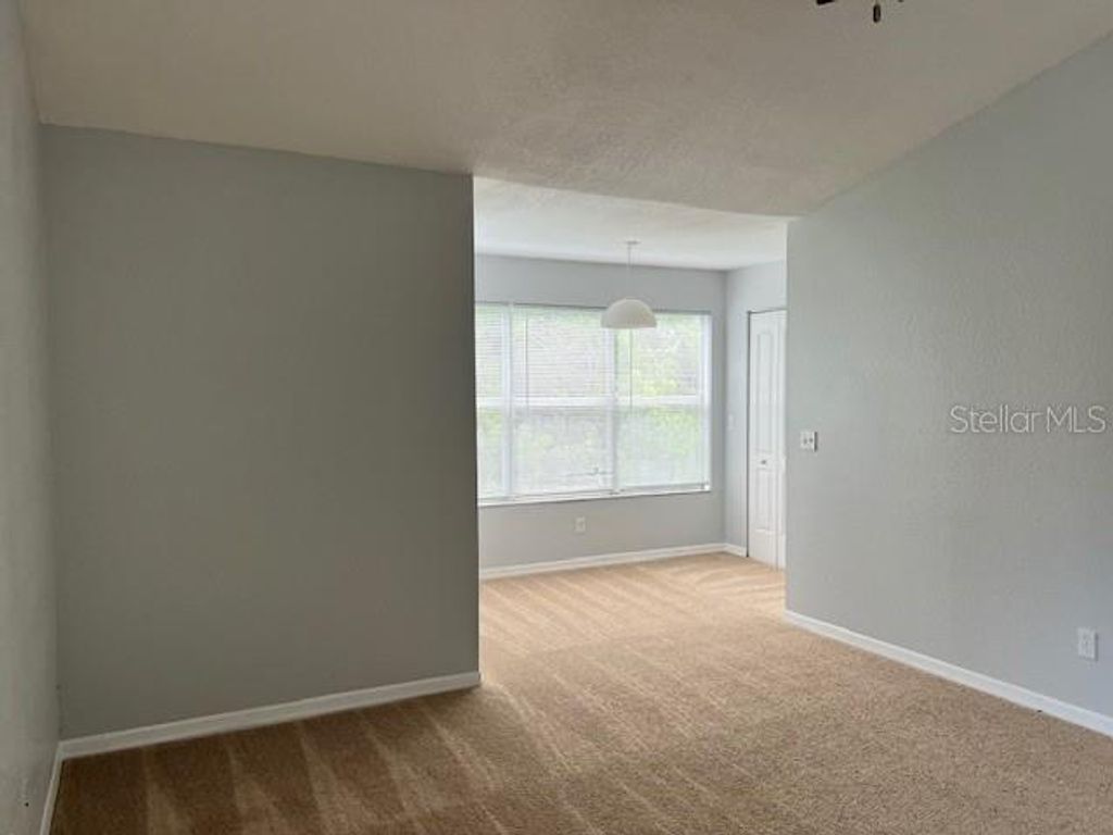 Photo of 5128 Conroy Road #22, Orlando, FL 32811 (MLS # O6370429)