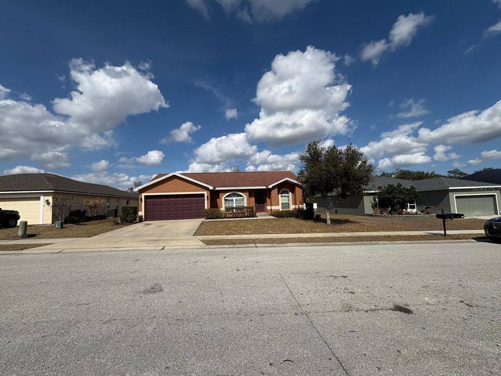 Photo of 1040 Merrimack Boulevard, Davenport, FL 33837 (MLS # O6383448)