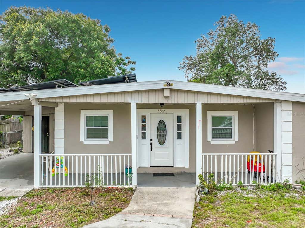 Photo of 5602 Astoria Place, Orlando, FL 32808 (MLS # O6431218)