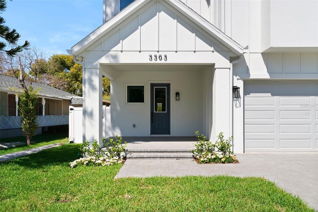 Photo of 3303 Iowa Ave, Tampa, FL 33611 (MLS # TB8460845)