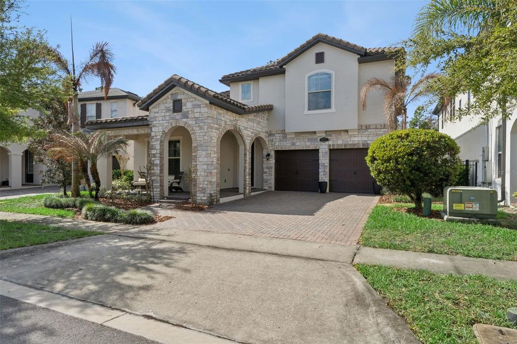 Photo of 8415 Vivaro Isle Way, Windermere, FL 34786 (MLS # O6391460)