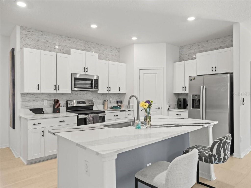 Photo of 9617 Branching Ship Trace, Wesley Chapel, FL 33545 (MLS # TB8369740)