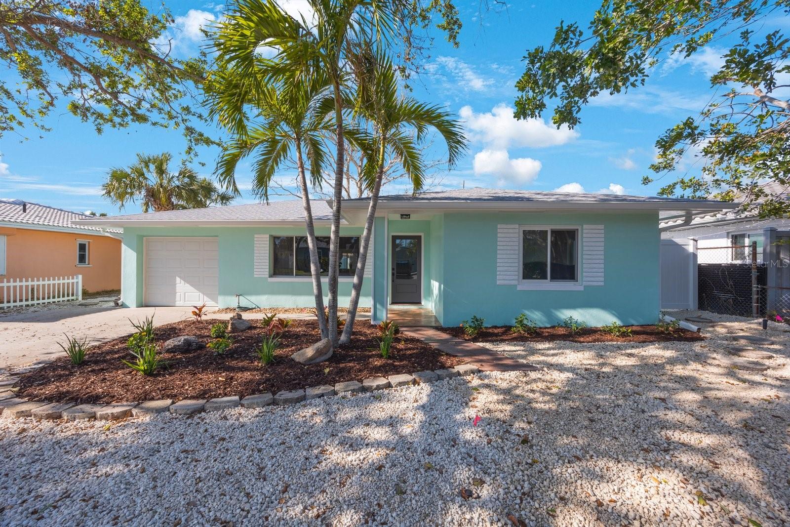 Seller is offering Seller Financing with a great rate! Welcome to this beautifully updated 3-bedroom, 2 and a half-bathroom home in the highly sought-after Belle Vista Neighborhood of St. Pete Beach. This property had No Storm Damage and is on one of the highest points in the great Belle Vista! Only one inch of water intrusion and was remediated immediately and completely renovated. Just minutes from shopping, dining, and local amenities and is located just a 5-minute walk from the stunning Gulf beaches!! This home offers a perfect blend of style, comfort, and functionality and has been thoughtfully renovated to provide a move-in ready experience in a fresh, modern living space with no detail overlooked. From the moment you step into this home, you'll notice the newly remodeled kitchen that boasts two-tone shaker cabinets, elegant quartz countertops, and brand-new appliances, perfect for cooking and entertaining. Both bathrooms have been thoughtfully updated with modern finishes, and the open floor plan provides ample natural light. The addition of a 1/2 bath in the rear living area offers added convenience and versatility. From the new electrical and plumbing throughout to the brand-new mini-split A/C system, this home offers energy-efficient features with a fully serviced central A/C unit and a newer roof (installed in 2018) that gives you peace of mind for years to come. Step out back to a private oasis complete with newly laid St. Augustine sod and a working fully serviced irrigation system. Whether you’re entertaining or relaxing, the new vinyl privacy fence ensures you can enjoy your space in peace. Other key updates include a new garage door motor with a warranty and brand new seamless gutters for excellent water management and beautiful cultured marble window sills. This home is turnkey and ready for you to move in and enjoy. Don’t miss your chance to own this stunning home with modern updates and exceptional features. Schedule a private tour today!
