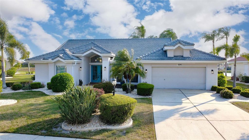 Photo of 1211 Peridot Ln, Sun City Center, FL 33573 (MLS # A4640812)