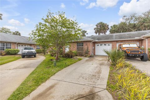 Photo of 711 River Oaks Circle, New Smyrna Beach, FL 32169 (MLS # NS1087759)
