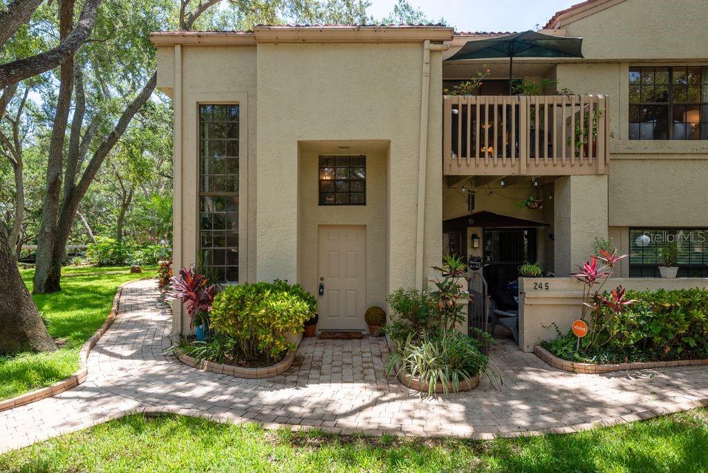 Canopy Views & Coastal Charm in Coveted Safety Harbor!
Welcome home to your Oasis in the treetops! This charming 2-story, 2-bedroom, 1-bath Corner Condo in the beloved Los Prados Community is bursting with character, natural light, and Florida flair — and yes, it’s pet-friendly too!
Nestled beneath majestic live oaks and Spanish moss, this condo lives like a secret garden retreat — with lush landscaping, three tranquil ponds, and a resort-style pool retreat featuring a heated pool, spa, kitchen, and more. Oh, and breathe easy: you're high and dry in Flood Zone X! Inside, the living space is Bright with soaring cathedral ceilings, bamboo flooring, and a spiral staircase with Iron Banister giving you chic Mediterranean vibes with a twist. Light pours through dramatic two-story windows, and your private balcony feels like you’re floating in the trees — complete with extra outdoor storage.
An open layout connects the living, dining, and modern kitchen in perfect harmony. Cook up a storm with newer stainless steel appliances, LED lighting (in kitchen and bathroom), Corian Countertops, and a Rotating Shelf for Plenty of usable storage just waiting to spin your spices, pots and pans into action. Yes, there’s a washer/dryer in-unit, and the well-maintained A/C (2015) keeps things cool year-round.
The spacious Primary bedroom includes bamboo floors and a newer remote-controlled ceiling fan for relaxing Sunday mornings. The Second Bedroom? It's a stunner — cathedral ceilings, large arched windows, and dreamy views of the pond, fountain, and pool. The bathroom sparkles with tile floors, modern fixtures, and stainless steel faucets.
With a monthly HOA of $646, nearly everything is covered — including water, sewer, cable, internet, maintenance, pest control, insurance, and two full-time staff members who help keep the community pristine.
Need more perks? Residents enjoy private access to Folly Farms Park, are steps from downtown Safety Harbor’s award-winning charm (think: Sunday markets, Third Friday parties, top-rated restaurants and galleries), and have a front-row seat to one of America’s top ten “Best Main Streets” (USA Today, 2025).
This condo also includes your own covered parking, guest spaces, and rental potential after 24 months with board approval.
This is more than a Condo — it’s a Florida Lifestyle tucked under the Oaks and Wrapped in Charm!