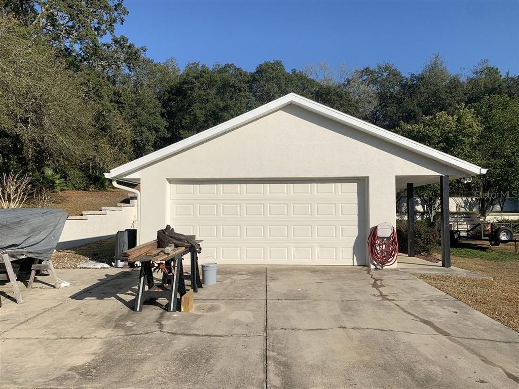 Photo of 939 N New London Terrace, Inverness, FL 34453 (MLS # OM716293)