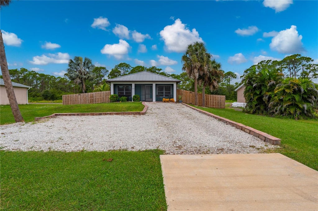 Photo of 1027 Campbell Street, Port Charlotte, FL 33953 (MLS # C7531658)