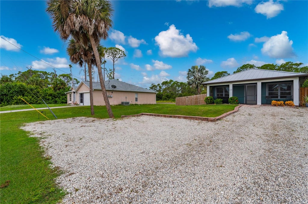 Photo of 1027 Campbell Street, Port Charlotte, FL 33953 (MLS # C7531658)