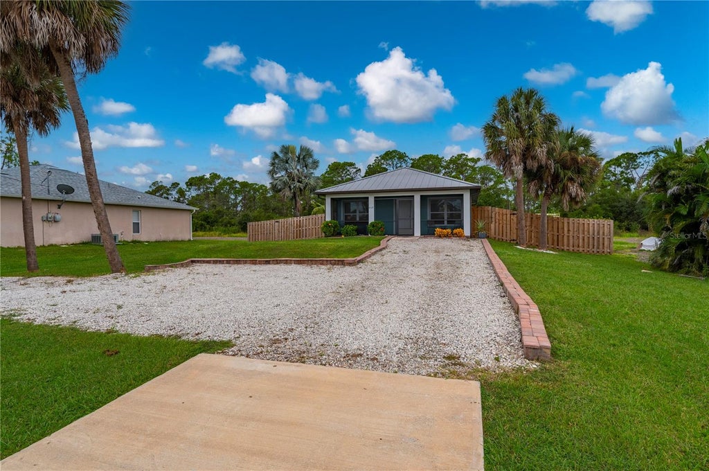 Photo of 1027 Campbell Street, Port Charlotte, FL 33953 (MLS # C7531658)