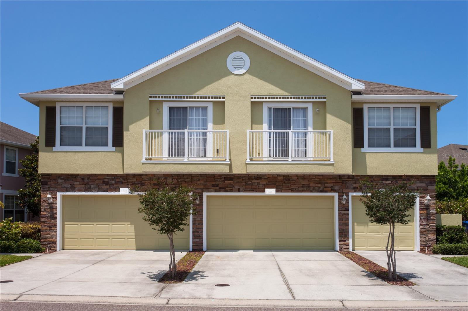 One or more photo(s) has been virtually staged. This beautifully updated townhome in Bay Breeze Cove , which does NOT require flood insurance, offers the perfect blend of privacy and modern luxury, with the feel of a single-family home and none of the noise! Nestled in a quiet, well-maintained community, the property is located just off 4th Street N and 50th Ave, you'll enjoy the convenience of being a short walk away from shopping, dining, and entertainment. With 3 spacious bedrooms, 2.5 baths, 1,480 square feet, and a 2 car garage, this home exudes both style and functionality. The kitchen features granite countertops and stainless steel appliances, ideal for entertaining or enjoying a quiet meal at home. The open-concept living and dining areas have abundant natural light and provide ample space for gatherings or relaxation. This beautifully updated townhome in Bay Breeze Cove offers the perfect blend of privacy, comfort, and modern luxury—with the feel of a single-family home and none of the noise! Located in a NON-FLOOD and NON-EVACUATION ZONE, this home is nestled in a quiet, well-maintained community just off 4th Street N and 50th Ave, placing you steps from shopping, dining, and entertainment. Offering 3 spacious bedrooms, 2.5 bathrooms, 1,480 square feet, and a 2-car garage, the layout is both stylish and functional. The kitchen features granite countertops and stainless steel appliances, ideal for hosting or enjoying a quiet night in. The open-concept living and dining areas are filled with natural light and provide the perfect setting for gatherings or relaxation. Upstairs, the primary suite is a true retreat with a large walk-in closet and an en-suite bath with dual vanities. Additional highlights include high ceilings, ample storage, and a private outdoor space perfect for enjoying Florida’s year-round sunshine. All roofs in the community were replaced in 2024, and this home includes a $7,000 Fabric Shield Hurricane Panel System by Home Safety Solutions. These lightweight, easy-to-install panels are made of translucent PVC-coated fabric that blocks wind, rain, and storm-driven debris—while still letting light into the home during the day. Additionally, ALL of the exteriors of the buildings in the community have painted in 2025. Bay Breeze Cove residents enjoy fantastic amenities, including a community pool and a dog park. Best of all, you’re just 10 minutes to Downtown St. Pete, 30 minutes to Tampa, and 30 minutes to the Gulf beaches. With its prime location, thoughtful upgrades, and low-maintenance lifestyle, this home has it all—don’t miss your chance to make it yours!