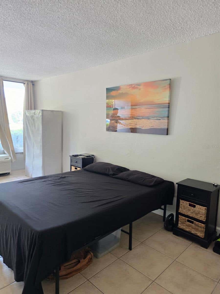 Photo of 7900 S Orange Blossom Trail #1055, Orlando, FL 32809 (MLS # O6436035)